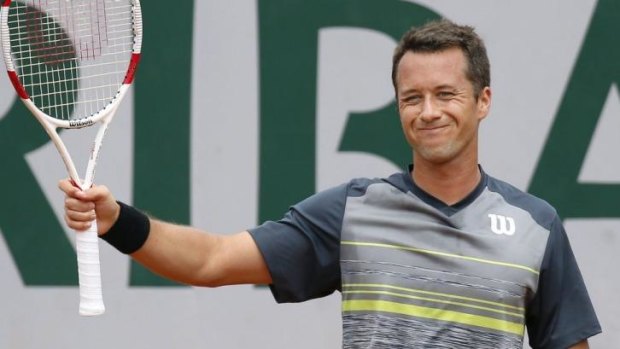 Germany's Philipp Kohlschreiber salutes the crowd.