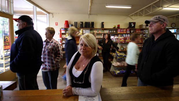 Cindy and Michael Read, two of the owners of Jindivick General Store, say its turnover has halved since Black Saturday because farmers are not spending.