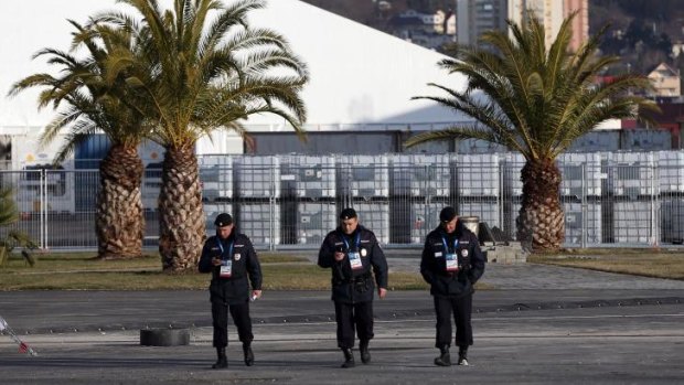 Heightened alert ... Security personnel walk in the Olympic Park in the Coastal Cluster on Thursday in Alder, Russia. The Sochi 2014 Winter Olympics start on February 6.