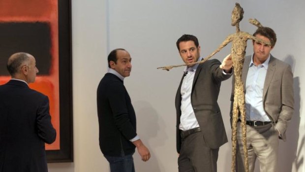 Alberto Giacometti's <i>L'homme au doigt</i> broke the record for most expensive sculpture sold at auction.