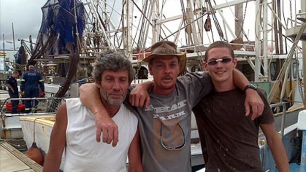 Romio part owner Andrew Watson, centre, with Wayne Fursman and Cameron Hoy, who rescued two men hurt in an explosion on board the fishing trawler.