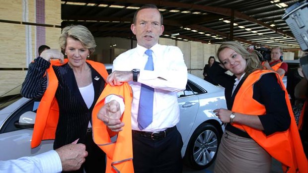 Julie Bishop, pictured with prime mnister-elect Tony Abbott and new LIberal MP Fiona Scott, says she's never considered herself a 'token woman'.