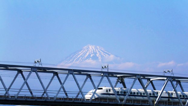 Need for speed ... a bullet train passes Mount Fuji.