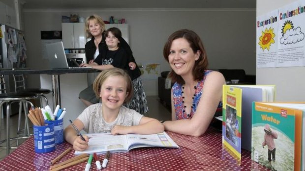 Home school families, rear from left Sue Gerrard from Dunlop with son A.J. Gerrard,10, and front, Suzannah Brough, 6 and mum Kim Brough from Duffy. 