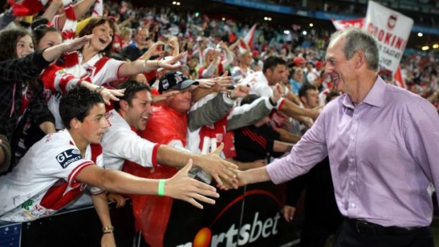 The drought is over: Wayne Bennett celebrates with St George Illawarra fans after the club's grand final win in 2010.