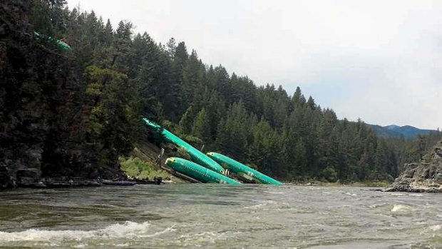 Boeing 737 fuselages lie on the embankment.