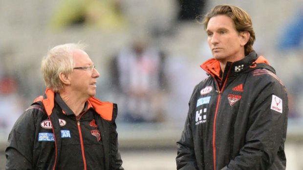 Mixed results: Essendon doctor Bruce Reid and banned coach James Hird.