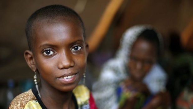Hamamatou Harouna, 10, sits in a tent with other Muslim refugees in Carnot, Central African Republic.