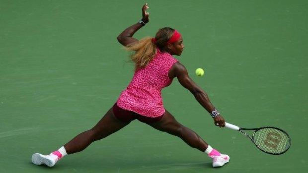 Hot shot: Serena Williams hits a return against Ekaterina Makarova in their US Open semi-final.