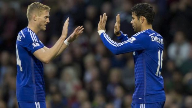 On the scoresheet: Diego Costa, right, celebrates with teammate Andre Schurrle.