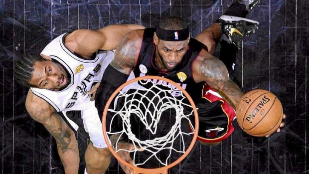 LeBron James scored 33 points as the Miami Heat levelled the NBA final series against the San Antonio Spurs.