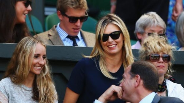 All smiles: Maria Sharapova watching her boyfriend Grigor Dimitrov in the men's semi-final against Novak Djokovic.
