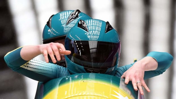 Jana Pittman and Astrid Radjenovic compete for Australia in the women's bobsleigh.