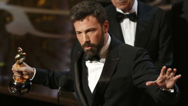Dark horse: Director, producer and star of <i>Argo</i> Ben Affleck accepts the Oscar for Best Picture.