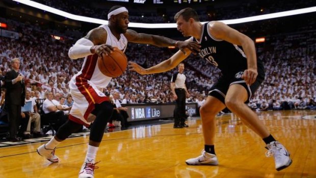 LeBron James of the Miami Heat drives against Mirza Teletovic of the Brooklyn Nets during game two of the Eastern Conference semi-finals on Thursday.