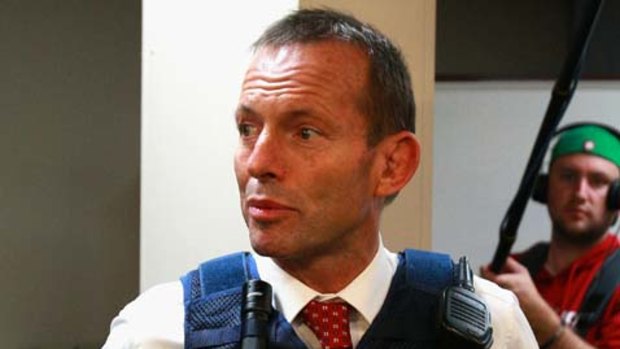 No lag back then...Opposition leader Tony Abbott tours Campbelltown police station during his 36-hour election marathon.