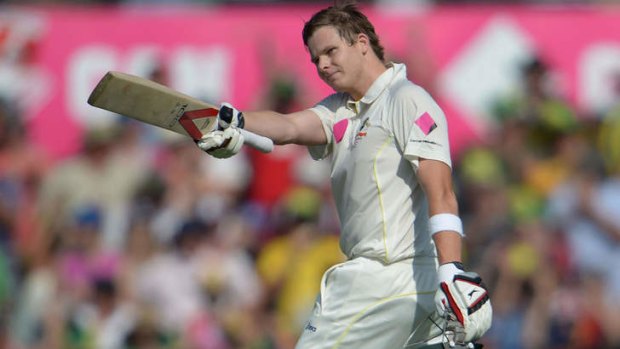 Third man: Steve Smith acknowledges his third century in six Tests.
