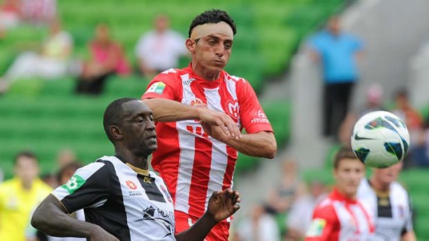 Boost: Heart will be buoyed by the return of defender Simon Colosimo (right).