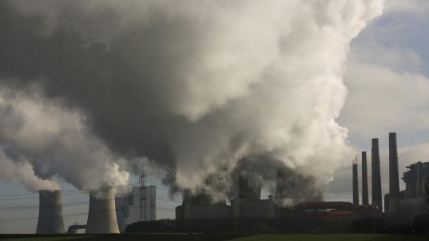 Smoke billows from the RWE brown coal power plant in Neurath, west of Cologne, Germany.