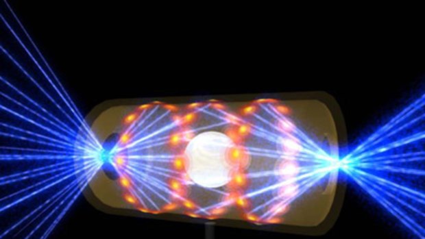 An artist's rendering shows a NIF target pellet inside a hohlraum capsule with laser beams entering through openings on either end.