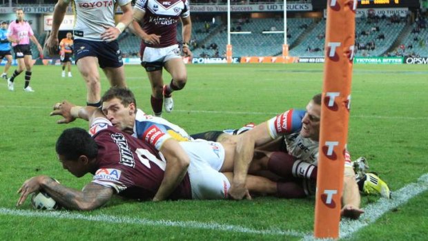 Try ... Referees' bosses Bill Harrigan and Stuart Raper says Jorge Taufua scored for Manly.