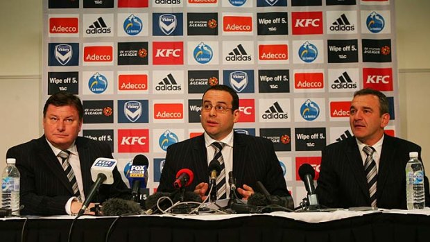 Melbourne Victory managing director Richard Wilson, chairman Anthony Di Pietro and coach Mehmet Durakovic announce the signing of Harry Kewell yesterday.