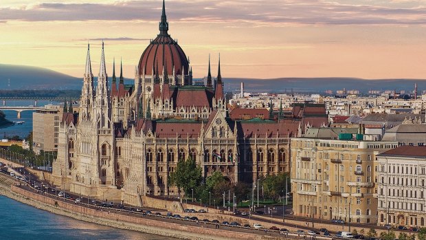 A Viking longship sails through Budapest.