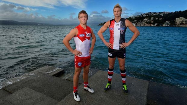 History-makers: Sydney captain Kieren Jack poses with St Kilda opposite number Nick Riewoldt in Wellington on Wednesday.
