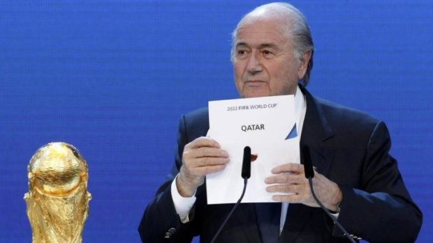 Tainted vote: FIFA President Sepp Blatter makes the announcement in Zurich in 2010. 
