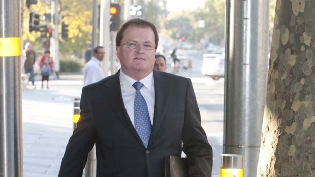 PricewaterhouseCoopers partner Stephen Cougle leaves the Federal Court in Melbourne.