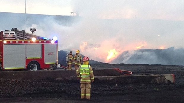 Firefighters battle the large blaze, which has proven difficult to douse.