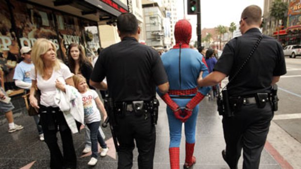 Under arrest ...  this was the latest in a string of incidents involving impersonators who compete for tips from tourists on Hollywood Boulevard.