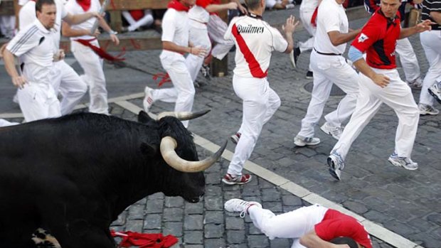 All hell breaks loose ... the running of the bulls in Pamplona, Spain.