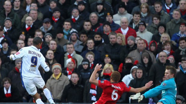 Jermaine Beckford of Leeds scores the winner against Manchester United.