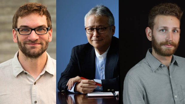 MIT PhD researchers Sean Follmer, left, and Daniel Leithinger, right, along with Professor Hiroshi Ishii of MIT's Tangible Media Group, centre.
