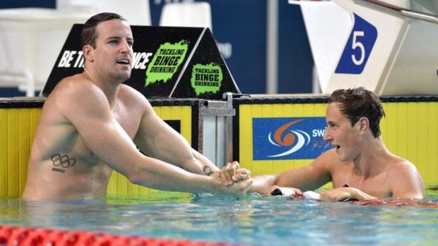 Too good: James Magnussen (left) congratulates Cameron McEvoy after the 100-metre final on Friday night.