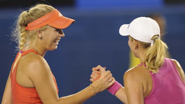 Now for round two ... Denmark's Caroline Wozniacki defeats Anastasia Rodionova of Australia.