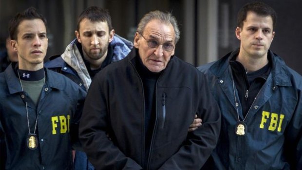 Alleged mobster Vincent Asaro is escorted by FBI agents from their Manhattan offices in New York.