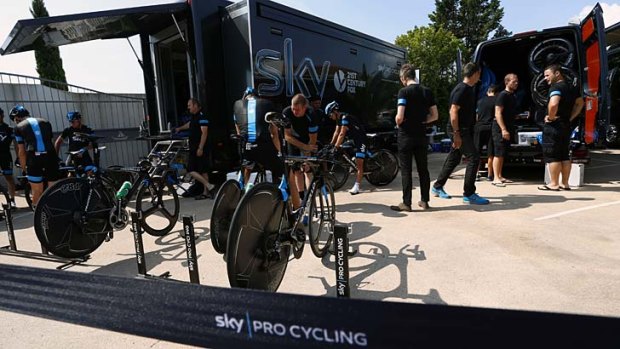 Members of the Sky team prepare their bikes in Porto-Vecchio.