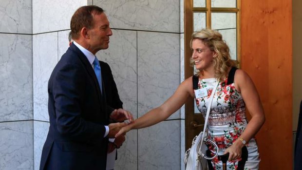 News: Prime Minister Tony Abbott hosts a  morning tea for Australian of the year candidates, Parliament House, Canberra. PM Tony Abbott greets Jacqueline Freney, NSW Young Australian of the Year 2014. 25th of January 2014. Canberra Times Photograph by Katherine Griffiths