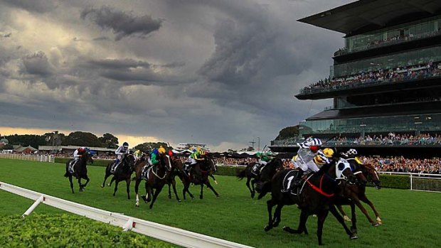 Guineas coup: Jim Cassidy sees off his fellow New Zealanders to ride Dissident to victory.