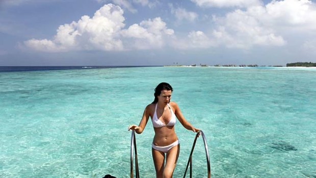 The new government in the Maldives is trying to reassure tourists the islands are still open for business despite current political unrest.