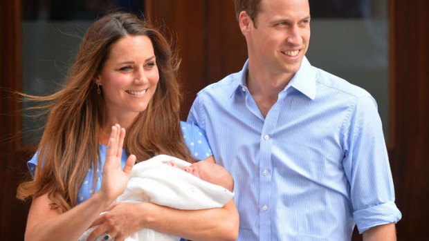 Royal wave: Prince William and Catherine, Duchess of Cambridge, show their new-born baby boy to the world.