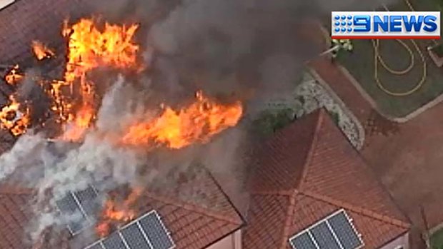 Fire rips through the Oxley home.