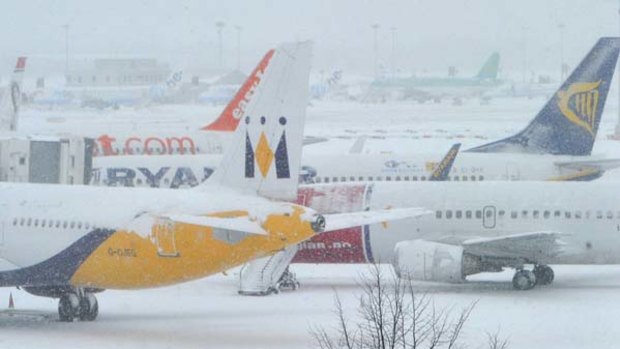 Flights cancelled ... planes sit on the tarmac at Gatwick Airport.