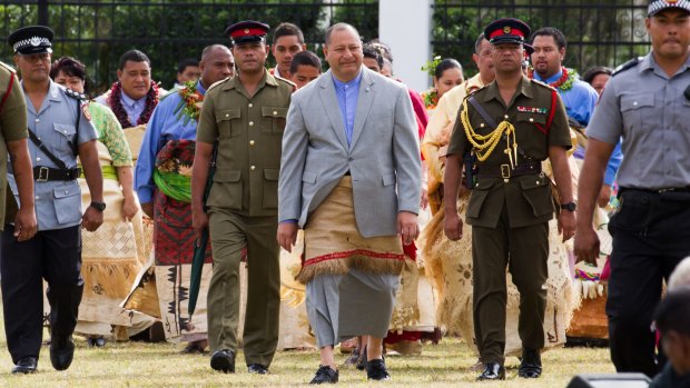 His Majesty King Tupou V1 arriving for tradional entertainment by school children.