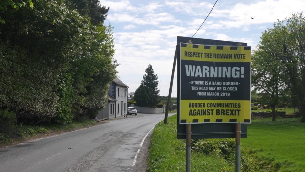 A sign by a group against Brexit is seen on an Northern Island road.
