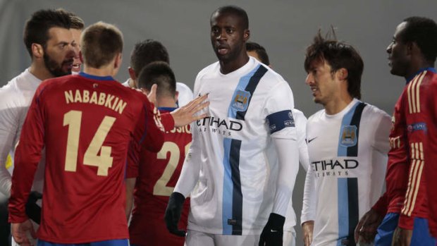 Manchester City's Yaya Toure shows his frustration at apparent racism during a champions league match outside Moscow.