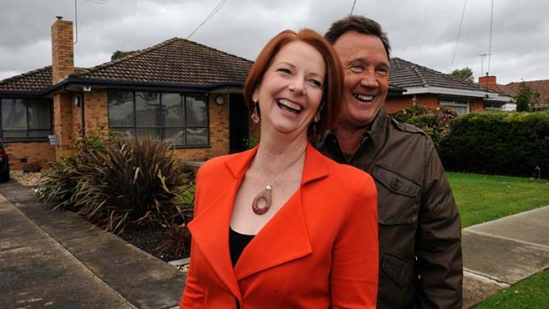 Former prime minster Julia Gillard, pictured with partner Tim Mathieson outside their home in Altona, has paid tribute to the local community.