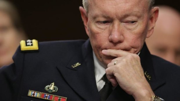 Possibility of troops on the ground: Chairman of the Joint Chiefs of Staff Army Gen. Martin Dempsey testifies before the Senate Armed Services Committee on Capitol Hill.